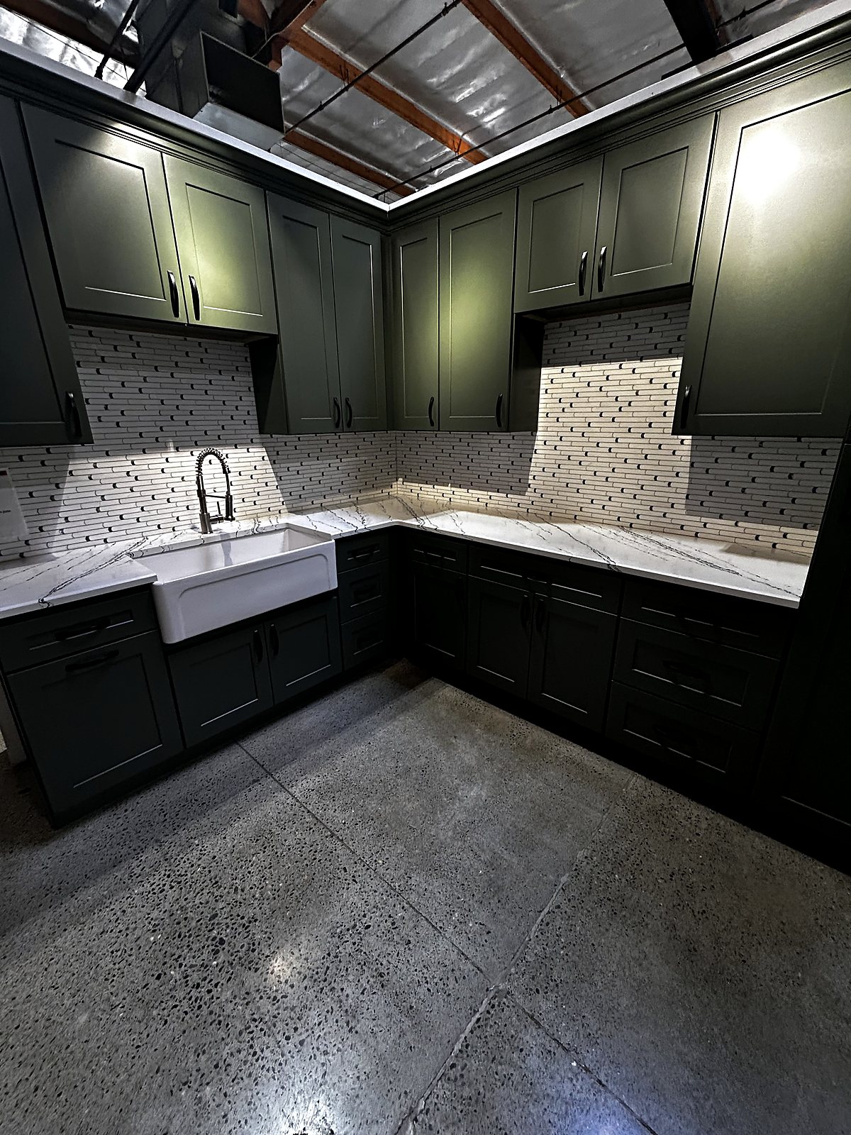 Dark green shaker cabinets kitchen renovation King County.