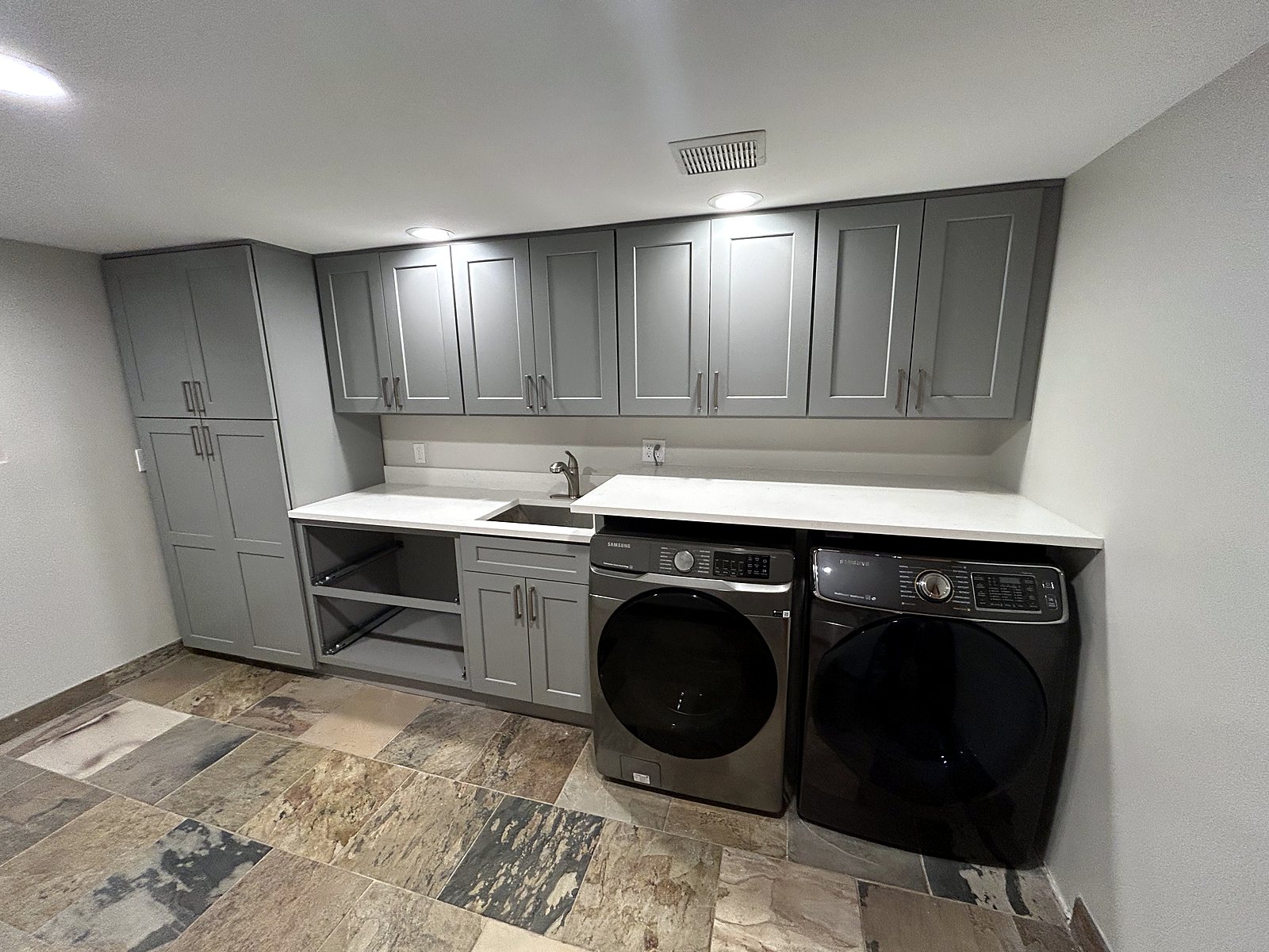 Gray shaker cabinets laundry room renovation King County.