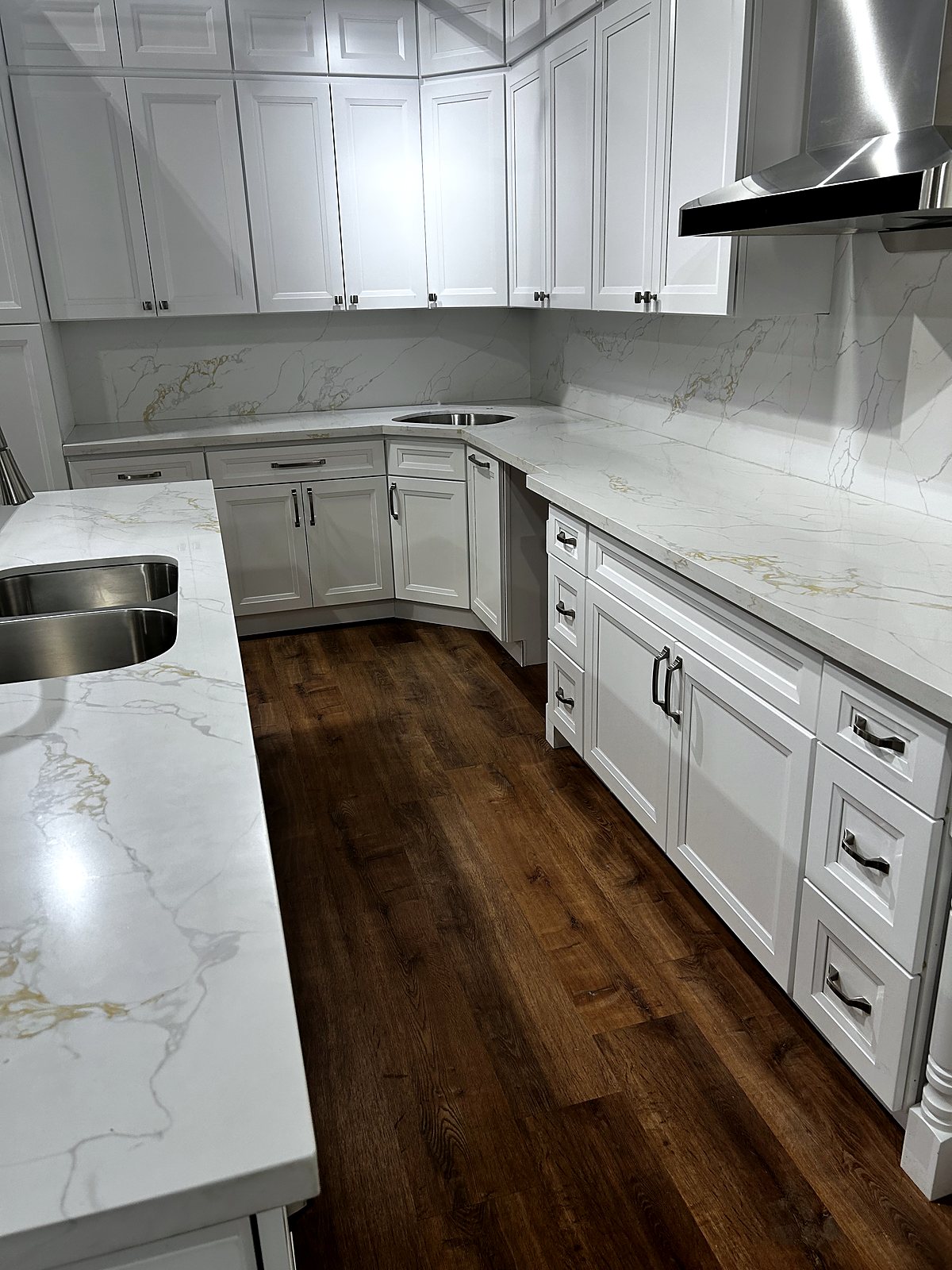 White shaker kitchen cabinets with quartz countertops, King County renovation.
